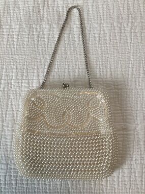 Pearl-Embellished White Clutch with Silver Chain
